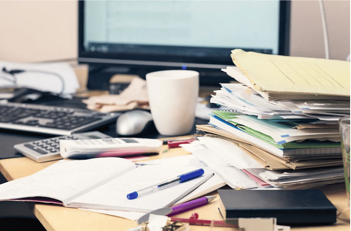 When your desk looks like this, you're not alone—many Canadian teachers still rely on paper stacks and scattered notes, but with Classroom Studio’s free lesson plan templates and curriculum planning tools, back-to-school doesn’t have to mean burnout.